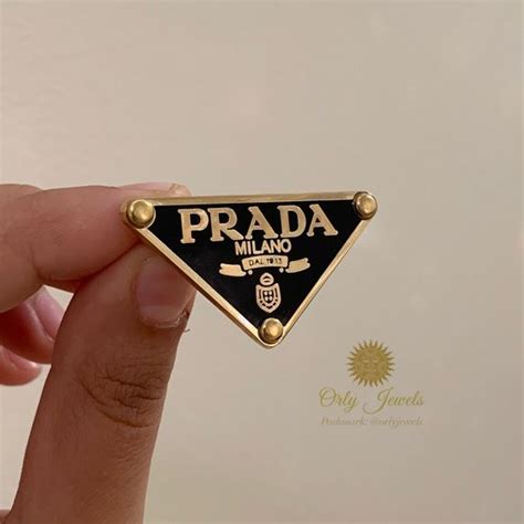 brooches and pins prada|prada lapel pin.